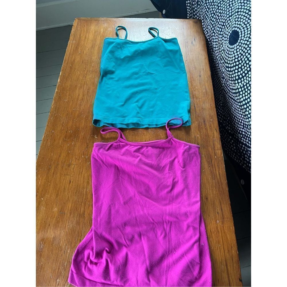 Bundle of girl’s seamless hot pink and teal tanks L 10-12